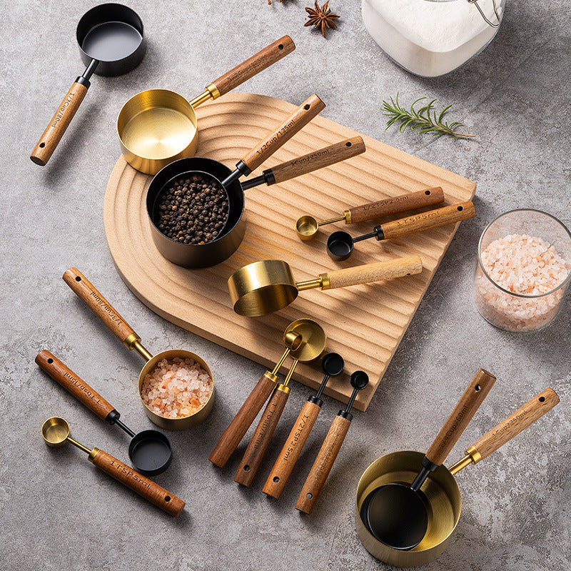 Blent10 8-piece stainless steel measuring cup and spoon set with walnut wood handles and scale markings
