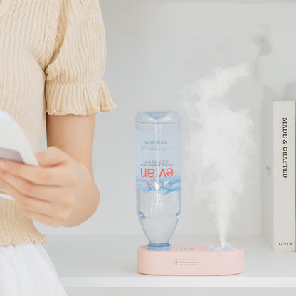Shop the Blent10 Aquarius USB mini humidifier with a portable, bottle-inspired design for desks, bedrooms, and suitable indoor spaces.