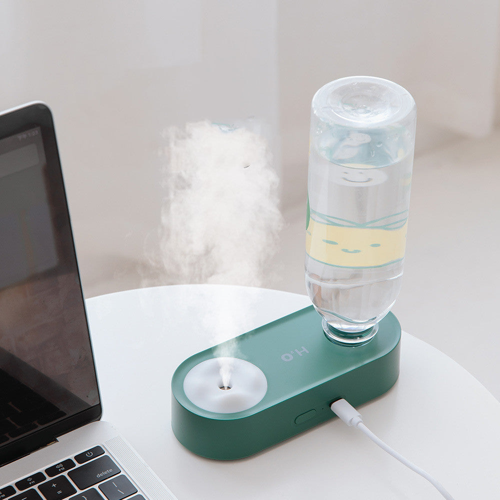 Shop the Blent10 Aquarius USB mini humidifier with a portable, bottle-inspired design for desks, bedrooms, and suitable indoor spaces.
