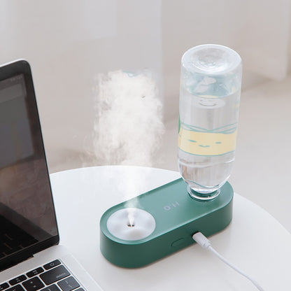 Shop the Blent10 Aquarius USB mini humidifier with a portable, bottle-inspired design for desks, bedrooms, and suitable indoor spaces.