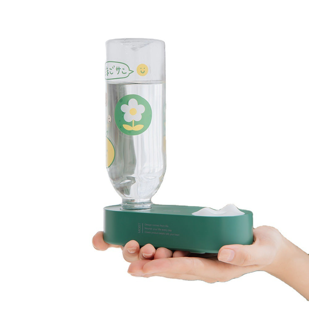 Shop the Blent10 Aquarius USB mini humidifier with a portable, bottle-inspired design for desks, bedrooms, and suitable indoor spaces.