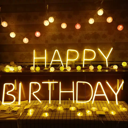 LED meteor firecracker lights spelling out Happy Birthday with glowing lights.