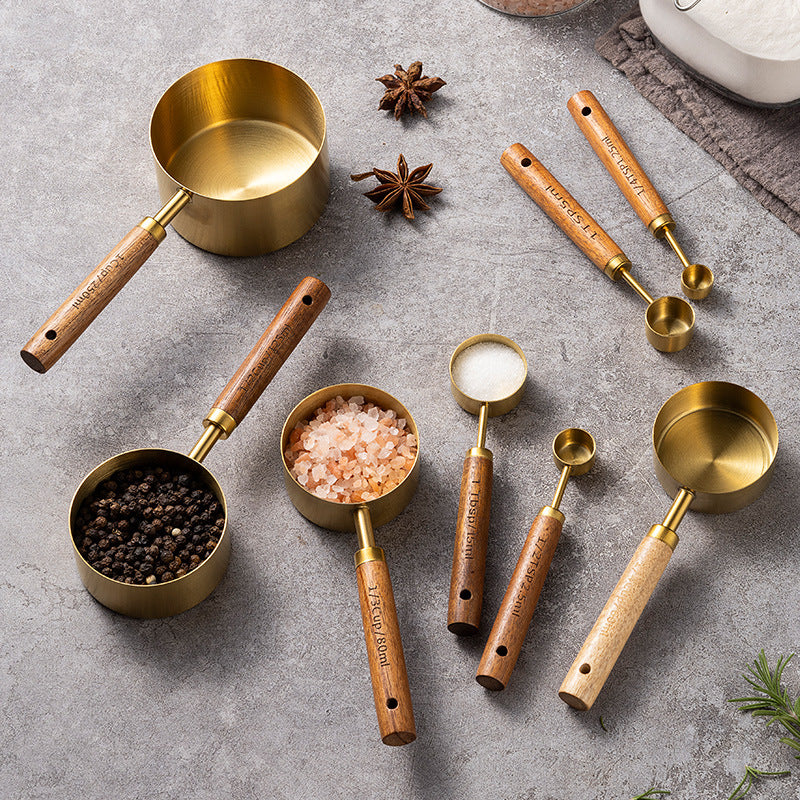 Blent10 8-piece stainless steel measuring cup and spoon set with walnut wood handles and scale markings