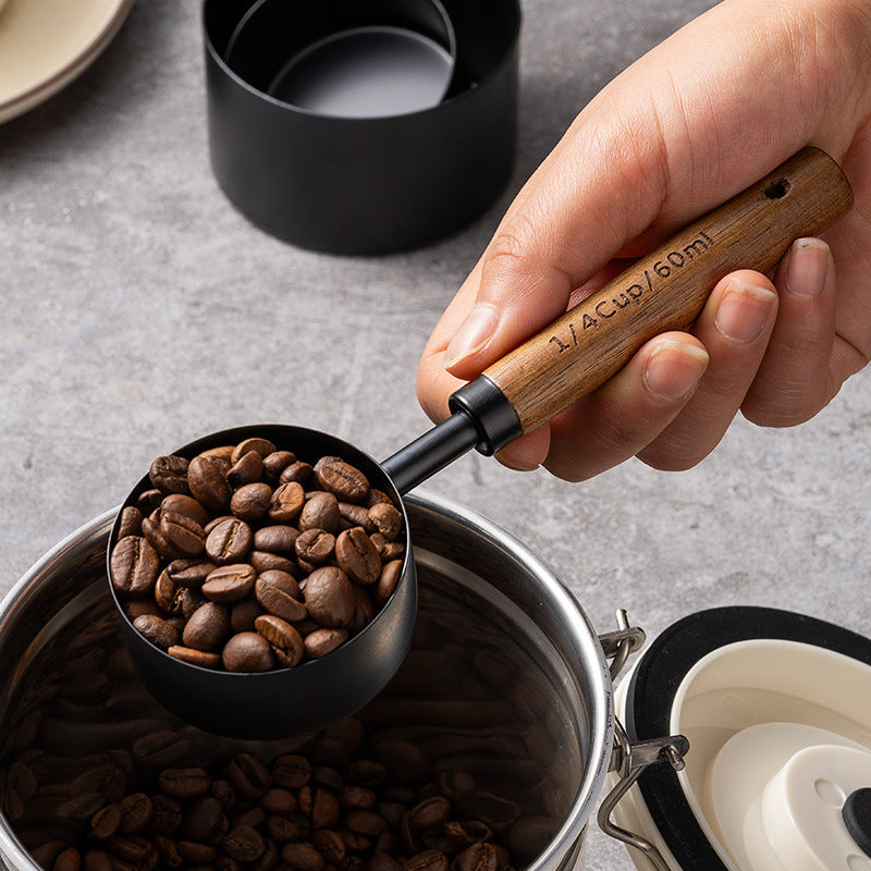 Blent10 8-piece stainless steel measuring cup and spoon set with walnut wood handles and scale markings